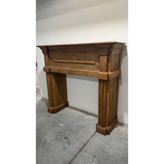 Add warmth and architectural charm to your space with this substantial fireplace mantel crafted from reclaimed wood....