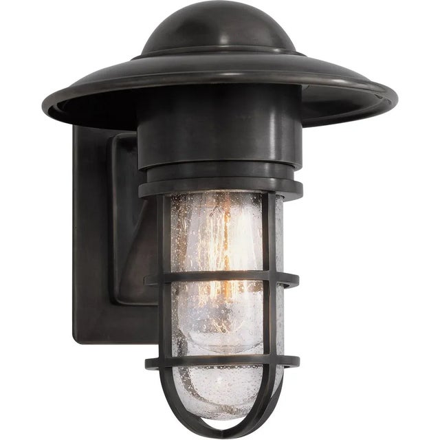 Marine Indoor/Outdoor Wall Light in Bronze with Seeded Glass Designer: Chapman & Myers Height: 10.5" Extension: 10"...