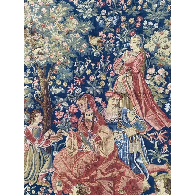 Very beautiful 20th century french tapestry with a museum medieval design and beautiful colors with blue field, mechanical...