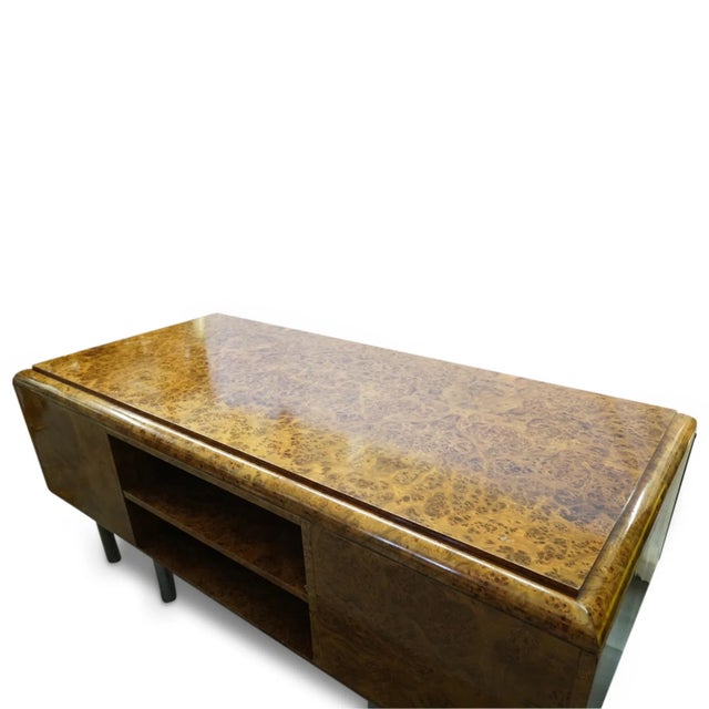 Art Deco Belgium Burl Wood Desk Early 20th Century, Belgium An Art Deco burl wood desk with center locking drawer flanked...