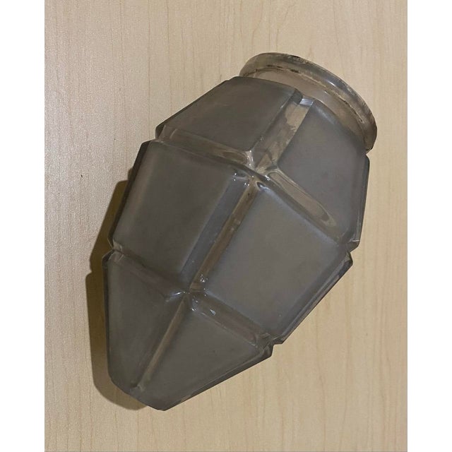 2.5” on top 5” diameter 6” tall Add a touch of timeless elegance and diffused light to your home with this stunning...