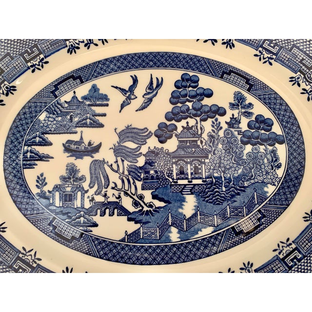 Churchill’s “Blue Willow” (Georgian shape) oval serving platter 14.5”. Blue and white dinner ware with the famous love...