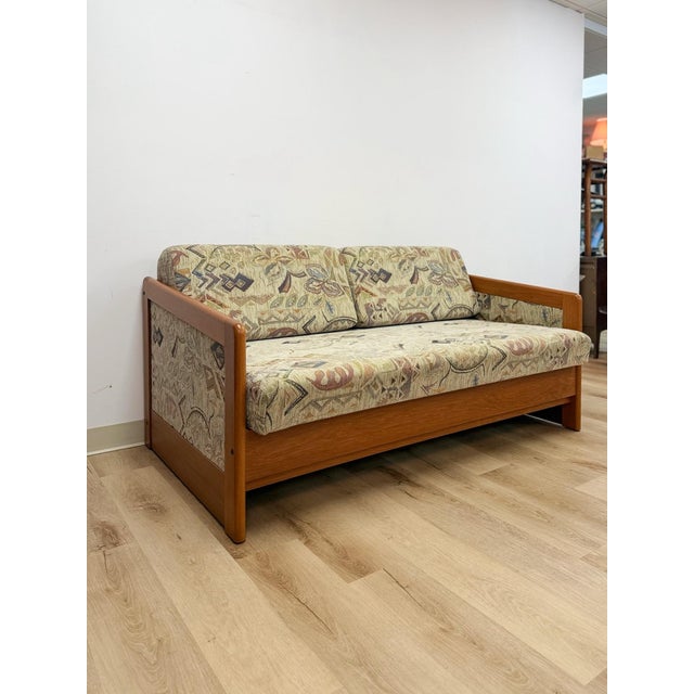 This beautiful vintage Hestbaek style Danish modern teak sleeper sofa is a genuinely rare and collectible Scandinavian...