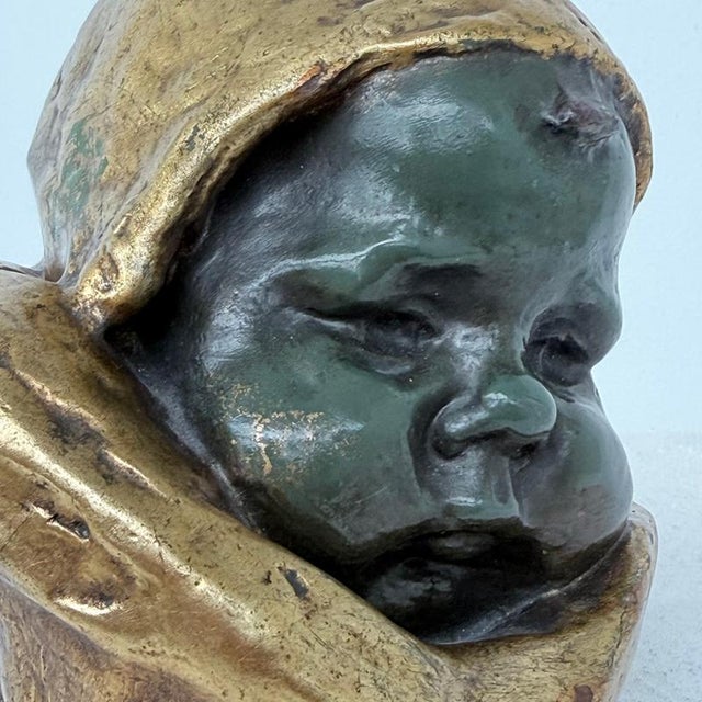 Art Deco Bust Sculpture in Polychromed Clay 1930s Expressive bust sculpture with a deeply modelled child’s face set within...