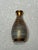 An exceptional mid-century modern ceramic bud vase, shape number 3981, produced by the venerable Stangl Pottery of...