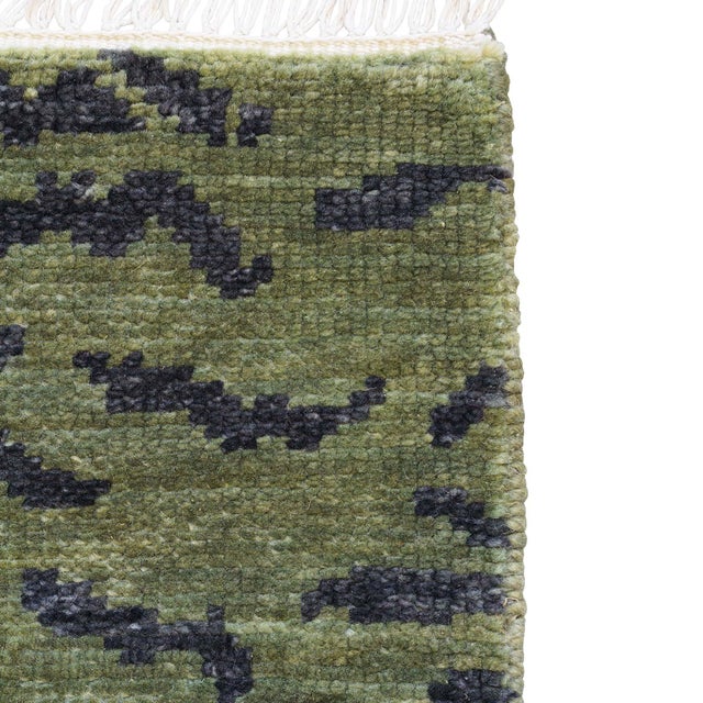 Adapted from one of our original textile designs, Bengal is a classic striped tiger pattern that is hand-knotted in a deep...