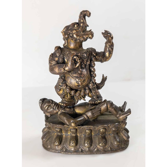 Chinese 17th or 18th Century Chinese Sino-Tibetan Gilt Bronze Buddhist Makala Faced Deity Figure For Sale - Image 3 of 18