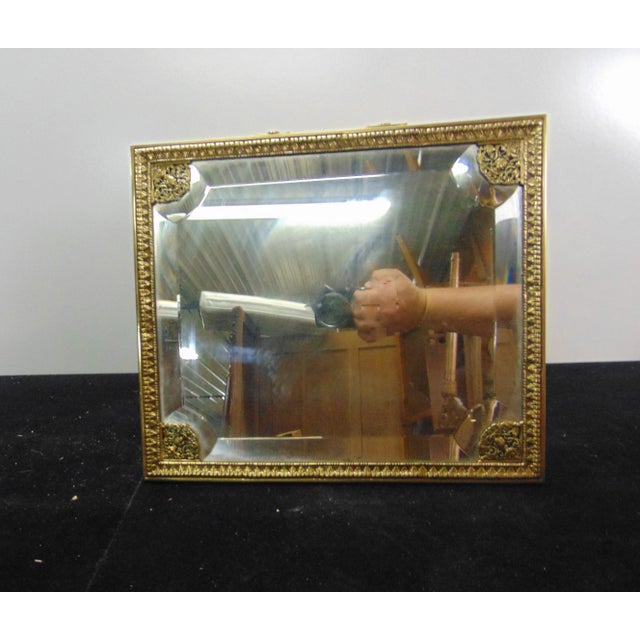 French style dresser mirror , brass frame with folding leg support, beveled glass mirror , 8"deep with leg in opened position