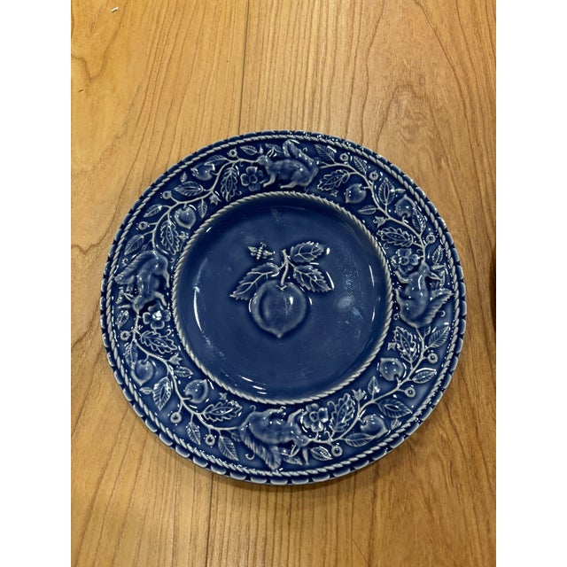 Whimsical set of three blue Bordallo Pinheiro's fantasy forest and farm animal ceramic plates. This set of three 8.25 in...