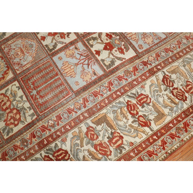 Oversize Geometric Persian Bakhtiari rug with an all-over garden design in rustic colors throughout Measures: 12'2'' x...