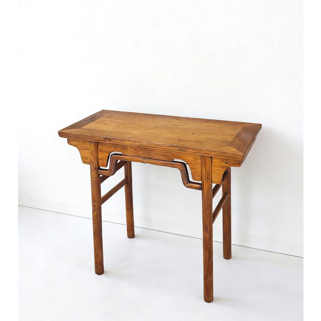 Retrieved from the Shanxi province of China, this altar-style elm console table features a classic three-panel top. The...