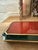 Elegant enameled wine red and dark green tray on small bun feet. Jay Strongwater is an American designer known for his...
