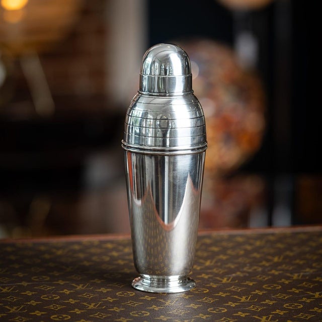 Vintage 20th century english silver plated cocktail shaker made by asprey of london. Featuring a polished, round tapered...
