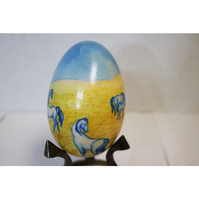 Beautiful, unique piece of art. I love the use of color on this egg, the baby blue and yellow complement each other...