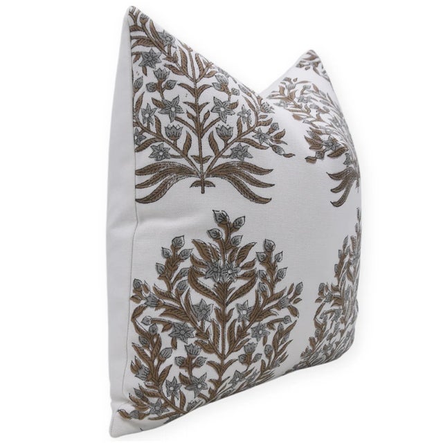 Bring the charm of Vrindavan into your home with this block print handmade cushion cover. Featuring the delicate...