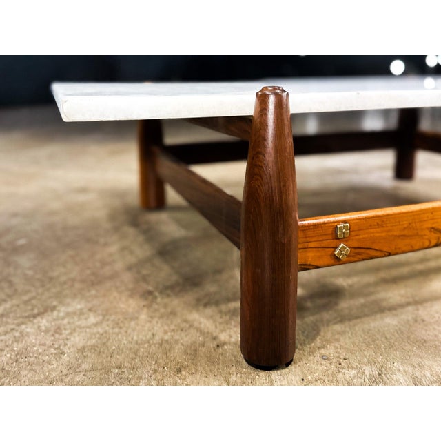 This refined coffee table, produced in Brazil by Cimo in the late 1950s to early 1960s, exemplifies the architectural...