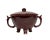 This ceramic vessel features a rich, glossy brownish-red glaze covering its exterior, complemented by two arched side...
