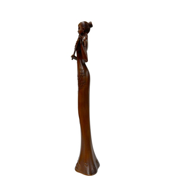 Elevate your interior design or antique collection with this exquisite vintage wooden artisan figurine, a masterful...