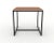 This table is made of woof with a steel structure. It features a solid wood tabletop veneered with cherry on top of 22mm...