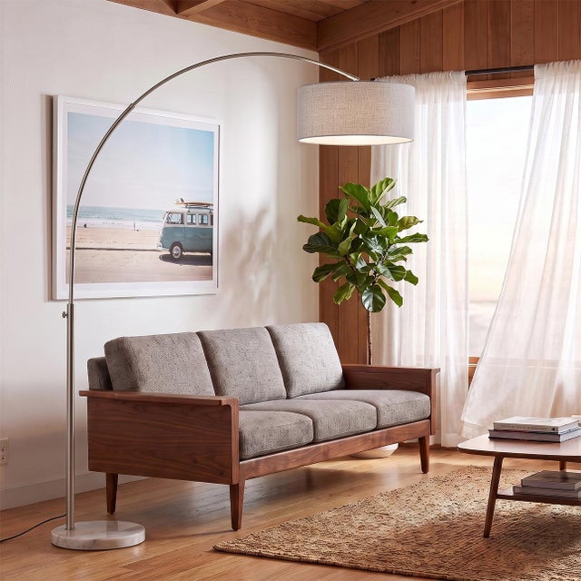 Transform any corner into a curated, magazine-worthy reading nook — this towering arc floor lamp pairs soft drum-shade...