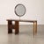 An exceptionally elegant Italian vanity console from the 1950s, masterfully crafted in richly grained dark walnut and...