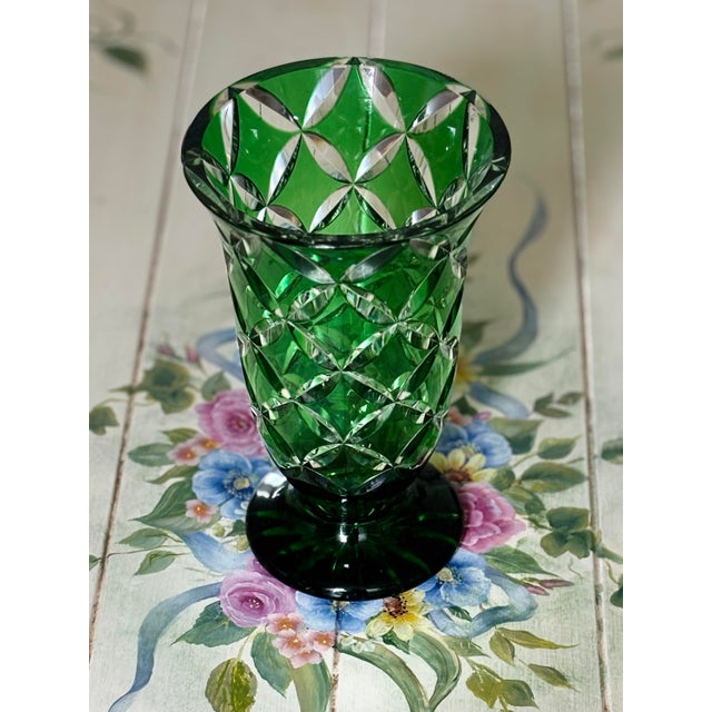 This breathtaking vintage West German cased lead crystal vase features an intricate geometric lens pattern and a...