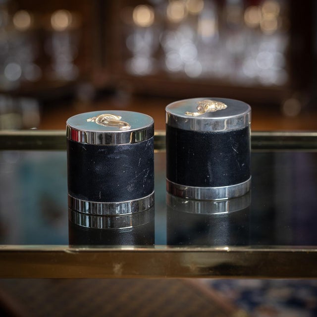 Vintage 20th century pair of french hermès cigarette boxes, crafted in silver plate and leather, each with a trompe l'oeil...