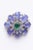 A stunning pair of faceted oval tanzanite stones interspersed with round faceted diamonds. Features a faceted oval emerald...