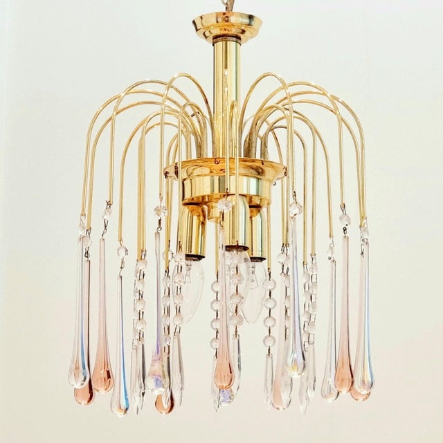 Stunning Murano glass waterfall chandelier with pink and transparent teardrop Murano glasses (Italy, 1970s). Brass...
