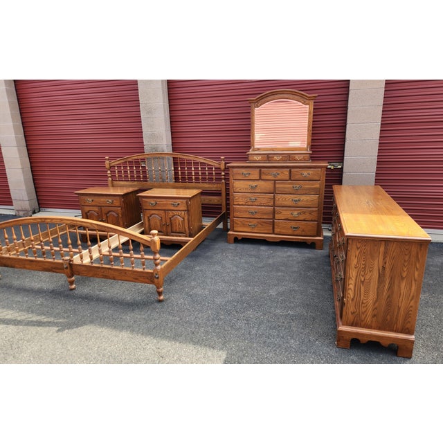 Complete king bedroom set by Durham Furniture, crafted in hardwood with a classic, substantial look and the quality...