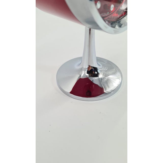 A stylish, original table clock by Rhythm, made in Japan. The model has a vintage/mid-century modern aesthetic, with a...