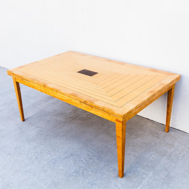 A large draw-leaf extension dining table by Giorgio Collection, made in Italy c. mid 1990s. The table comprises a...