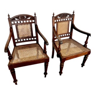 Antique Anglo-Indian Style Carved Armchairs With Woven Caning For Sale
