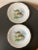 A beautiful set of two (2) French Limoges porcelain fish plates, France, circa early to mid 20th century. Piece showcases...