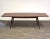 A stunning mid century modern French ribbon mahogany dining table in the style of Gio Ponti. This tables comes with two...