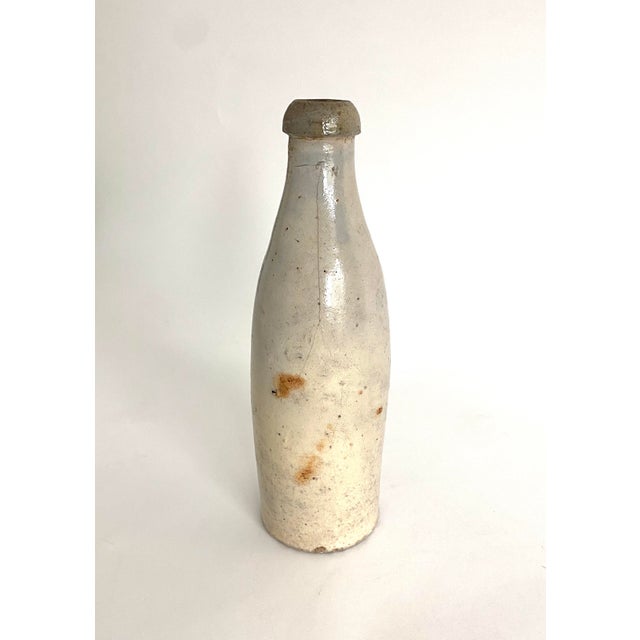 Antique German stoneware beer bottle with amazing color and patina. Organic handmade beauty with a history one can only...