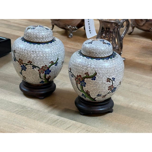 Design Plus Gallery presents a Pair of Cloisonné Ginger Jars. This pair of antique jars are antique and done with very...