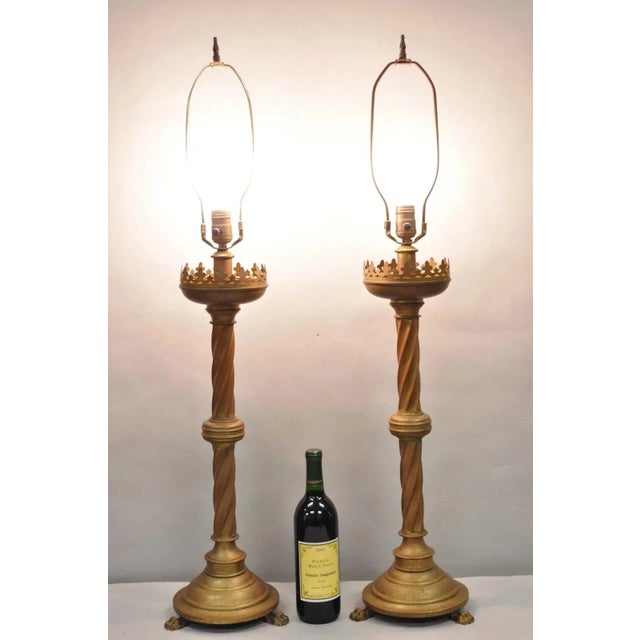 Antique English Renaissance Gothic Patinated Brass Candlestick Table Lamps with Tripod Paw Feet - a Pair. Circa Late 19th...