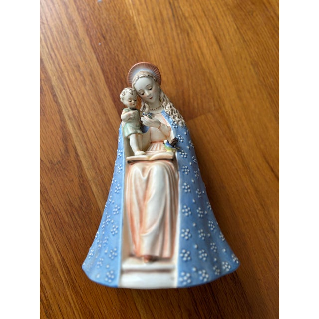 A beautiful mid-century example of the beloved M.I. Hummel "Flower Madonna" (Mold #10/1), expertly crafted by Goebel in...
