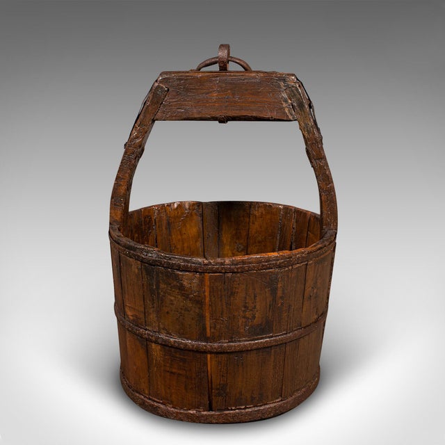 This is a superb antique Georgian period well bucket, offering rustic charm and versatile use, circa 1800. This estate-...