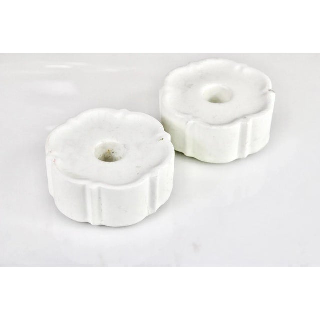 Candleholders Carrara in ceramic by Wilhelm Kåge This piece is designed in the style of the selected designer and/or...