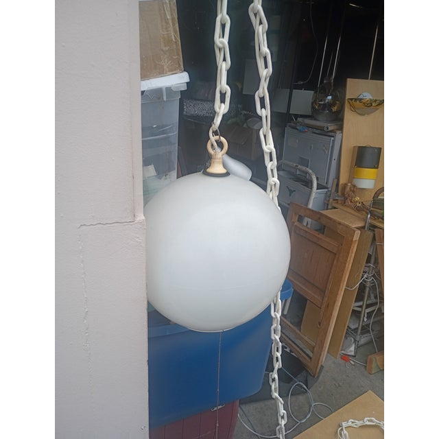 This lamp is by is a late 1970's Sag pendant globe lamp its made of a acrylic globe 14" diameter along with a 14 '...