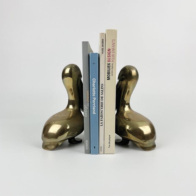 Pair of brass bookends. Circa 1960 Weight: 1600 g Dimensions Height: 17.5 cm Width: 9 cm Depth: 14 cm