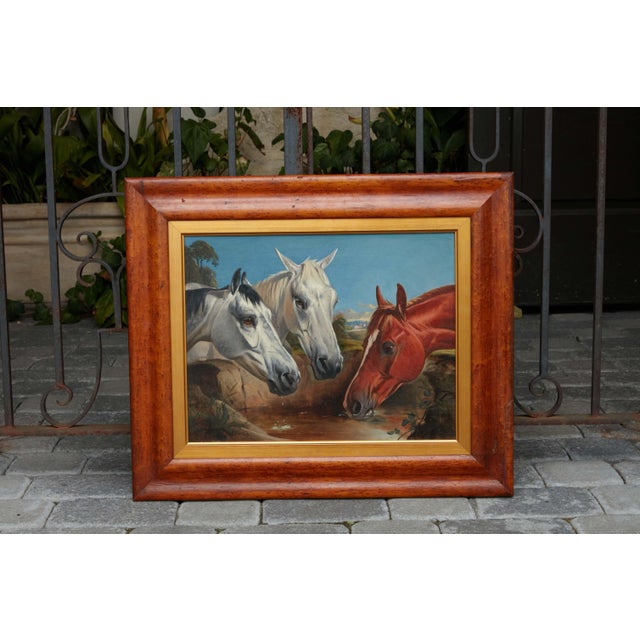 An English oil on board equestrian painting from the 19th century by John Alfred Wheeler (1821-1903) titled "The Watering...