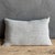 15" x 25" Color: Off White / Light Gray Blue Undertone Belgian Otis linen pillow in Greige — a refined, soft-white accent...