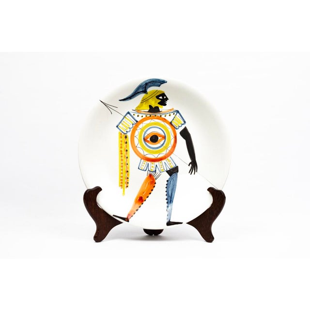 Hand-Painted Glazed Earthenware Plate with Eye-Shield Hoplite by Roger Capron for Vallauris, 1960, in Flawless conditions....