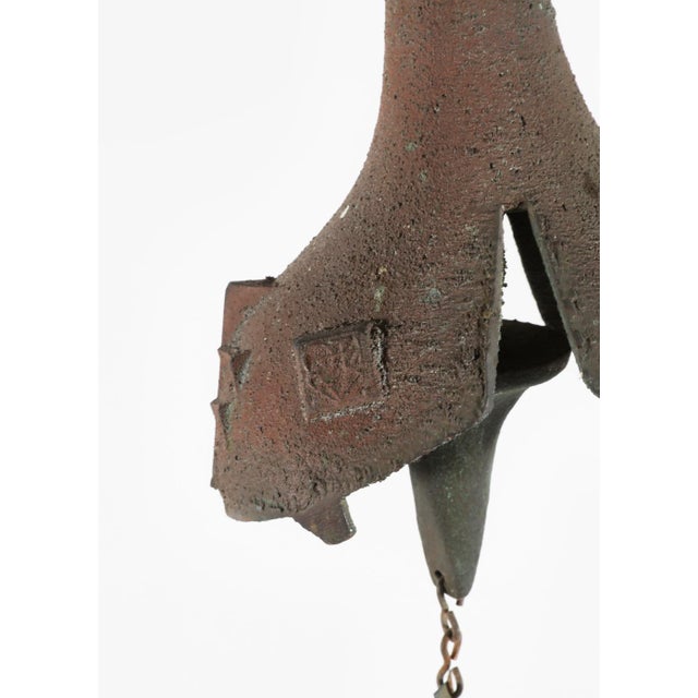 A vintage hand-crafted cast patinated bronze wind bell designed for Arcosanti, an experimental Arizona community by...