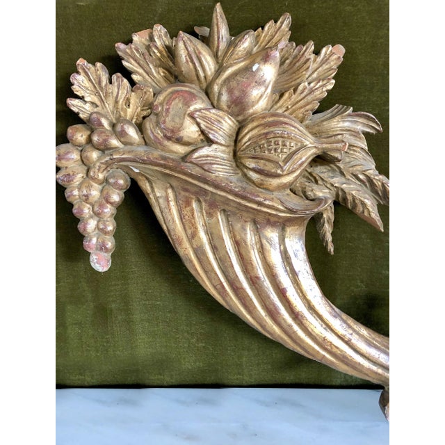 Original early 20th century Tuscan giltwood frieze with cornucopia, scrolls, and florals. Finely and intricately hand-...
