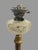 Impressive antique Victorian oil lamp attributed to Palmer & Co., retaining its ornate period burner assembly and...