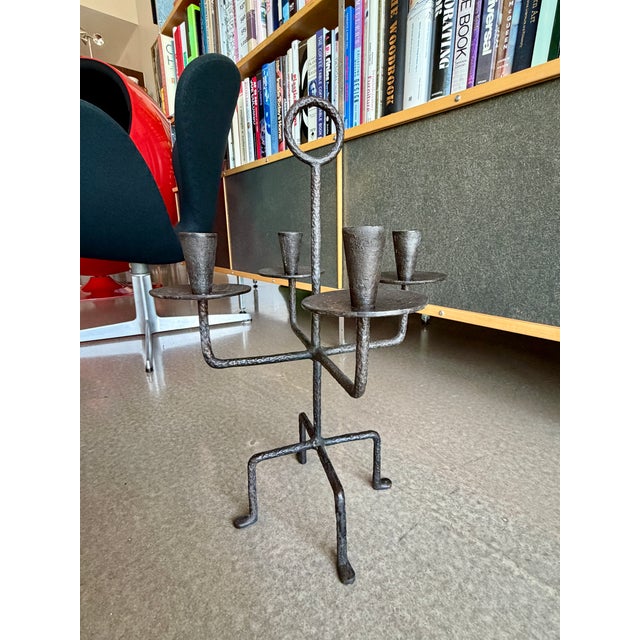 Designed circa 1930 by Tommi Parzinger for the Rena Rosenthal studio, this four-arm candelabrum is a notable example of...